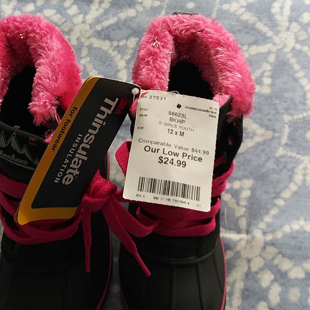 In new condition skechers waterproof size 12 for baby